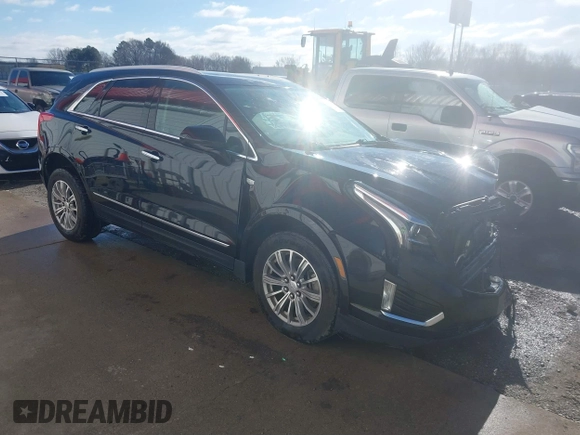 2017 Cadillac XT5 Luxury FWD with VIN 1GYKNBRS5HZ164209, listed as a IAAI auction lot 41213572 with 144,039 mi miles. Bid and sale history available at carsss.com. Image 1.