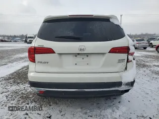 2018 Honda Pilot Touring z VIN 5FNYF6H99JB028034, wystawiony jako Copart lot #45143085 z przebiegiem 70 060 mil mil oraz Szkoda całkowita • Salvage title. Historia ofert i sprzedaży dostępna na DreamBid. Obrazek 6.