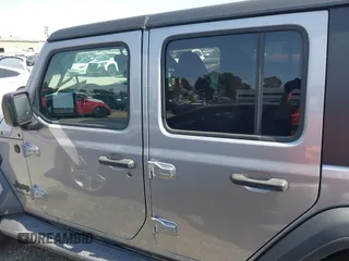 2021 Jeep Wrangler Unlimited Sport Altitude with VIN 1C4HJXDGXMW662493, listed as a IAAI auction lot 41288957 with 64,808 mi miles and . Bid and sale history available at DreamBid. Image 15.