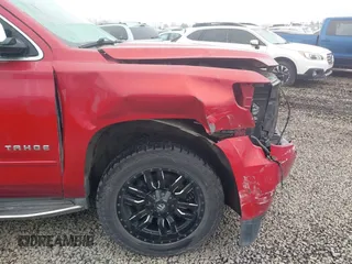 2015 Chevrolet Tahoe LTZ z VIN 1GNSKCKC6FR276531, wystawiony jako IAAI lot #41692617 z przebiegiem 124 010 mil mil oraz . Historia ofert i sprzedaży dostępna na DreamBid. Obrazek 19.