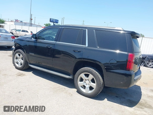 2020 Chevrolet Tahoe LS with VIN 1GNSCAKCXLR293278, listed as a IAAI auction lot 41973191 with 61,907 mi miles and . Bid and sale history available at DreamBid. Image 3.