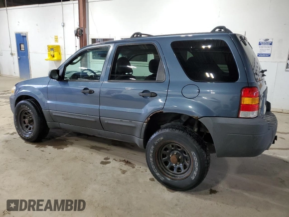 2005 Ford Escape XLT z VIN 1FMYU93145KB29172, wystawiony jako Copart lot #57724475 z przebiegiem 146 236 mil mil oraz Szkoda całkowita • Salvage title. Historia ofert i sprzedaży dostępna na DreamBid. Obrazek 2.