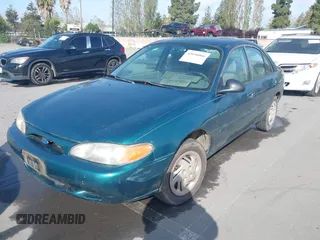 1997 Ford Escort LX with VIN 1FALP13P3VW125396, listed as a IAAI auction lot 42036066 with 132,239 mi miles. Bid and sale history available at carsss.com. Image 6.