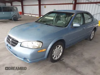2000 Nissan Maxima GXE z VIN JN1CA31D1YT727156, wystawiony jako IAAI lot #42145772 z przebiegiem 208 427 mil mil oraz . Historia ofert i sprzedaży dostępna na DreamBid. Obrazek 2.