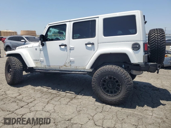 2015 Jeep Wrangler Unlimited Rubicon с VIN 1C4BJWFG3FL771508, выставлен на аукционе Copart как лот 62006295 с пробегом 108 128 миль миль и Списание • Salvage title. История ставок и продаж доступна на DreamBid. Изображение 2.
