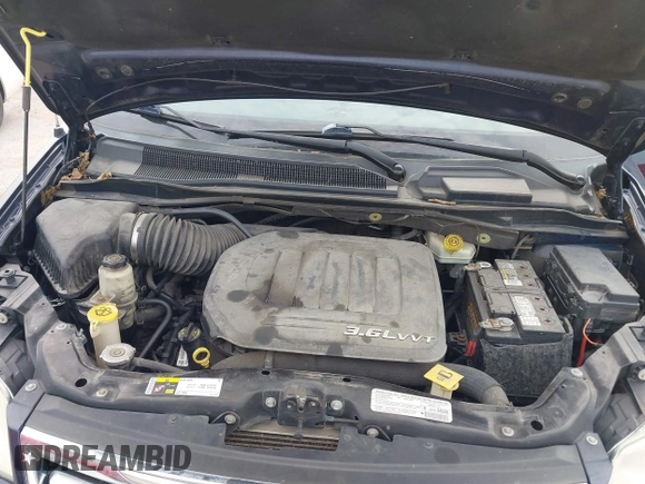 2013 Chrysler Town & Country Touring with VIN 2C4RC1BG4DR707032, listed as a IAAI auction lot 42008357 with 183,104 mi miles and . Bid and sale history available at DreamBid. Image 10.