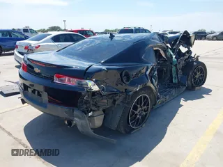 2014 Chevrolet Camaro LS z VIN 2G1FA1E32E9126043, wystawiony jako IAAI lot #42253189 z przebiegiem 104 457 mil mil oraz . Historia ofert i sprzedaży dostępna na DreamBid. Obrazek 4.