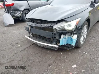 2014 Infiniti Q50 Premium z VIN JN1BV7AR2EM705630, wystawiony jako IAAI lot #42258650 z przebiegiem 109 151 mil mil oraz . Historia ofert i sprzedaży dostępna na DreamBid. Obrazek 18.