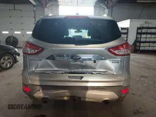 2015 Ford Escape Titanium z VIN 1FMCU9J96FUB23902, wystawiony jako IAAI lot #42497188 z przebiegiem 164 452 mil mil oraz . Historia ofert i sprzedaży dostępna na DreamBid. Obrazek 16.