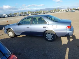 2000 Toyota Camry CE with VIN 4T1BG22K6YU000857, listed as a IAAI auction lot 42118645 with 244,448 mi miles and . Bid and sale history available at carsss.com. Image 14.