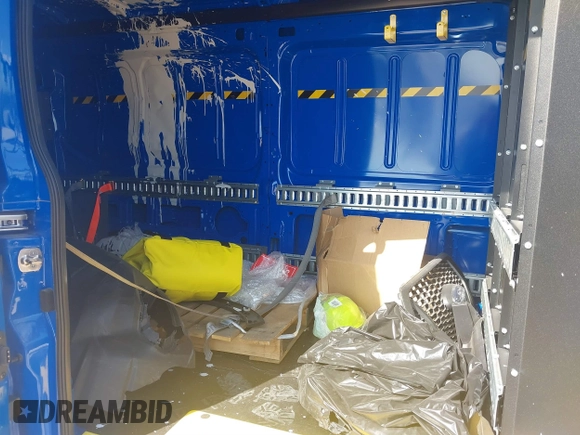 2024 Ford Transit Cargo with VIN 1FTBR1C82RKA26803, listed as a IAAI auction lot 40440250 with 1,197 mi miles and . Bid and sale history available at DreamBid. Image 8.