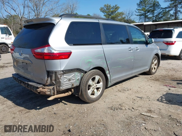 2015 Toyota Sienna LE AAS with VIN 5TDKK3DC4FS557542, listed as a IAAI auction lot 41756997 with 256,000 mi miles. Bid and sale history available at carsss.com. Image 4.