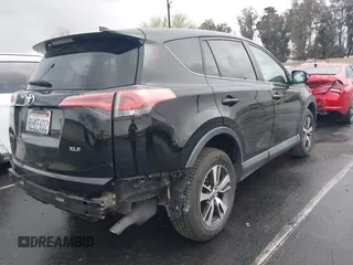2018 Toyota RAV4 XLE with VIN 2T3WFREV3JW516867, listed as a IAAI auction lot 41765369 with 54,390 mi miles. Bid and sale history available at carsss.com. Image 4.