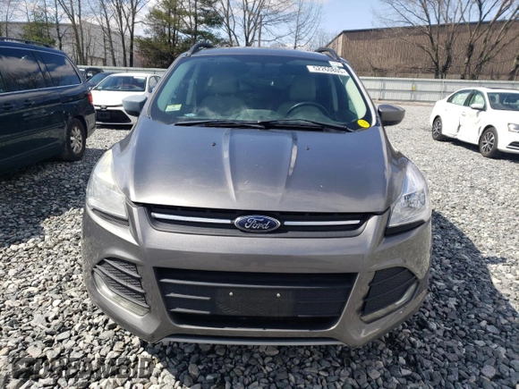 2014 Ford Escape SE with VIN 1FMCU9G9XEUA96094, listed as a Copart auction lot 52260805 with 143,791 mi miles and Clean Title. Bid and sale history available at DreamBid. Image 5.