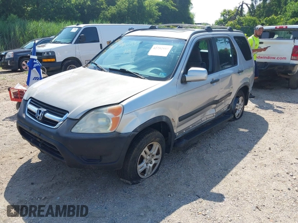 2002 Honda CR-V EX with VIN JHLRD78822C046562, listed as a IAAI auction lot 42752103 with 312,890 mi miles and . Bid and sale history available at DreamBid. Image 2.