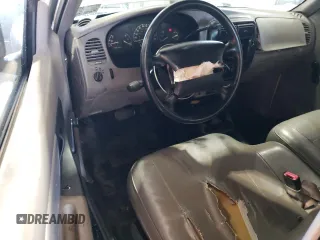 2000 Ford Ranger XL with VIN 1FTYR10V1YTA13232, listed as a Copart auction lot 54483055 with 217,473 mi miles and Salvage Title. Bid and sale history available at DreamBid. Image 8.
