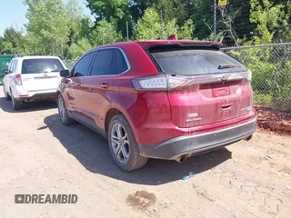 2015 Ford Edge Titanium z VIN 2FMTK3K97FBB06890, wystawiony jako IAAI lot #42241919 z przebiegiem 179 181 mil mil oraz . Historia ofert i sprzedaży dostępna na DreamBid. Obrazek 3.