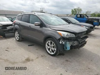 2013 Ford Escape Titanium z VIN 1FMCU0J98DUB64363, wystawiony jako Copart lot #54772925 z przebiegiem 109 956 mil mil oraz Szkody całkowita. Historia ofert i sprzedaży dostępna na DreamBid. Obrazek 4.