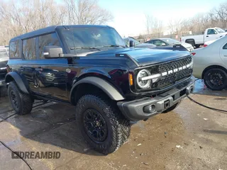 2023 Ford Bronco with VIN 1FMEE5DP9PLB82362, listed as a IAAI auction lot 41443809 with 13,567 mi miles and . Bid and sale history available at DreamBid. Image 1.