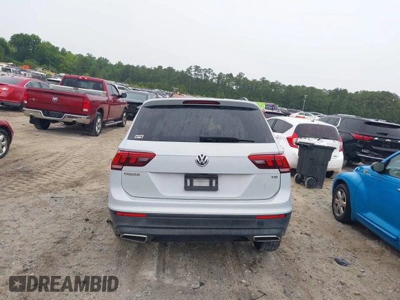 2018 Volkswagen Tiguan S with VIN 3VV1B7AX0JM041120, listed as a IAAI auction lot 42219662 with 160,852 mi miles and . Bid and sale history available at DreamBid. Image 16.