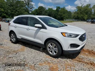 2020 Ford Edge SEL z VIN 2FMPK3J94LBA57940, wystawiony jako Copart lot #54901165 z przebiegiem 117 096 mil mil oraz Szkoda całkowita • Salvage title. Historia ofert i sprzedaży dostępna na DreamBid. Obrazek 4.