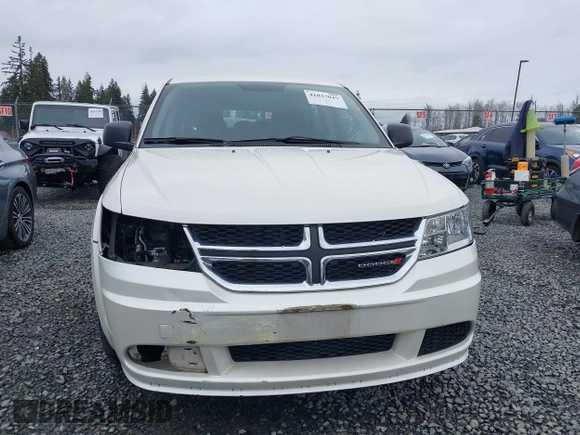 2015 Dodge Journey SE z VIN 3C4PDCAB6FT736330, wystawiony jako IAAI lot #41837047 z przebiegiem 123 567 mil mil oraz . Historia ofert i sprzedaży dostępna na DreamBid. Obrazek 13.