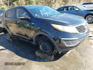 2011 Kia Sportage LX z VIN KNDPBCA2XB7100921, wystawiony jako IAAI lot #41553598 z przebiegiem Nie podano mil oraz . Historia ofert i sprzedaży dostępna na DreamBid. Obrazek 1.