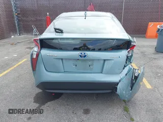 2016 Toyota Prius Four z VIN JTDKARFU8G3018145, wystawiony jako IAAI lot #42195308 z przebiegiem 87 649 mil mil oraz . Historia ofert i sprzedaży dostępna na DreamBid. Obrazek 16.