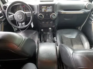 2016 Jeep Wrangler Unlimited Sahara z VIN 1C4HJWEGXGL198684, wystawiony jako Copart lot #49936525 z przebiegiem 158 396 mil mil oraz Szkoda całkowita • Salvage title. Historia ofert i sprzedaży dostępna na DreamBid. Obrazek 8.