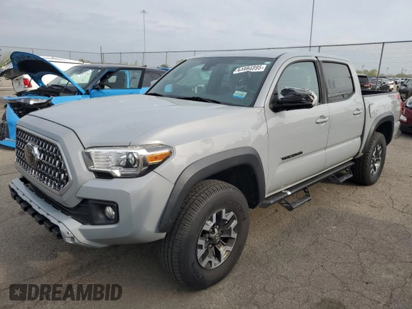 2019 Toyota Tacoma SR z VIN 3TMCZ5AN0KM227229, wystawiony jako Copart lot #54984895 z przebiegiem 244 400 mil mil oraz Czysty tytuł • Clean title. Historia ofert i sprzedaży dostępna na DreamBid. Obrazek 1.