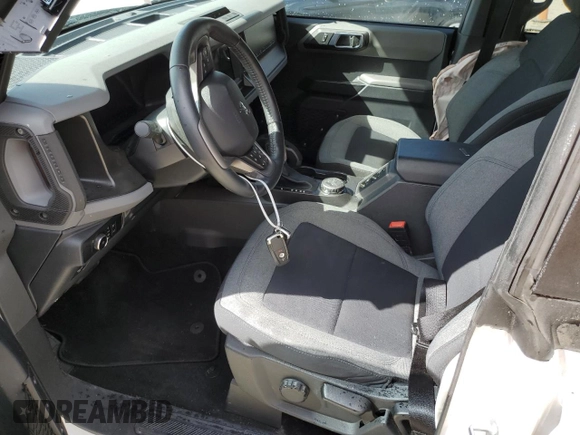 2023 Ford Bronco с VIN 1FMEE5BP1PLB15340, выставлен на аукционе Copart как лот 47647285 с пробегом 36 881 миль миль и На запчасти • Non repairable. История ставок и продаж доступна на DreamBid. Изображение 7.