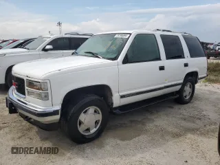 1998 GMC Yukon with VIN 1GKEK13R9WJ711087, listed as a Copart auction lot 73795594 with 177,708 mi miles and Non Repairable. Bid and sale history available at carsss.com. Image 1.