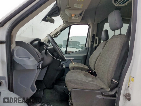 2015 Ford Transit XL with VIN 1FBAX2CM6FKA52776, listed as a Copart auction lot 56257115 with 270,005 mi miles and Salvage title. Bid and sale history available at DreamBid. Image 7.