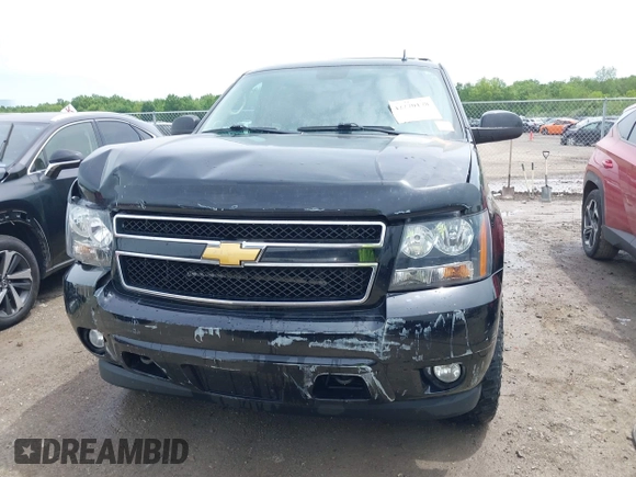 2012 Chevrolet Suburban LT with VIN 1GNSKJE75CR189265, listed as a IAAI auction lot 42270178 with 171,219 mi miles and . Bid and sale history available at DreamBid. Image 12.