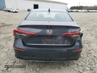 2023 Honda Civic Sport z VIN 2HGFE2F50PH556908, wystawiony jako Copart lot #52789655 z przebiegiem Nie podano mil oraz Szkoda całkowita • Salvage title. Historia ofert i sprzedaży dostępna na DreamBid. Obrazek 6.