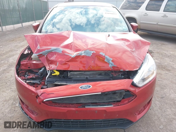 2018 Ford Focus SE with VIN 1FADP3FE6JL318552, listed as a IAAI auction lot 42090857 with 81,624 mi miles. Bid and sale history available at carsss.com. Image 6.