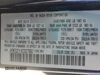 2014 Mazda CX-5 Touring z VIN JM3KE2CYXE0327950, wystawiony jako Copart lot #51390585 z przebiegiem 129 523 mil mil oraz Czysty tytuł • Clean title. Historia ofert i sprzedaży dostępna na DreamBid. Obrazek 13.