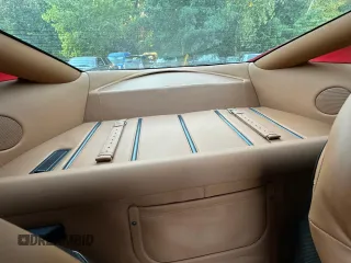 2007 Ferrari 599 z VIN ZFFFC60A870153007, wystawiony jako Copart lot #82527214 z przebiegiem 13 264 mil mil oraz Tytuł czysty. Historia ofert i sprzedaży dostępna na DreamBid. Obrazek 6.