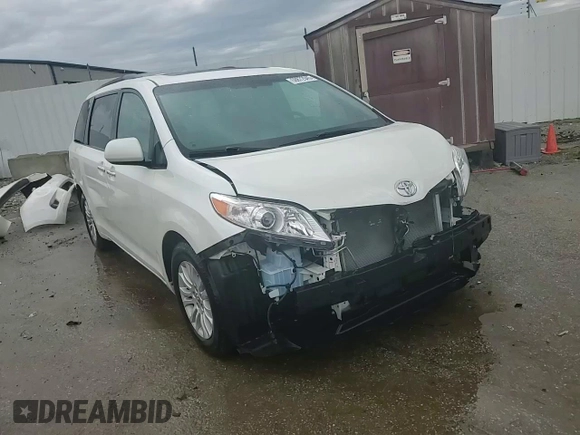 2015 Toyota Sienna XLE with VIN 5TDYK3DC6FS630405, listed as a Copart auction lot 59872045 with 60,306 mi miles and Salvage title. Bid and sale history available at DreamBid. Image 15.