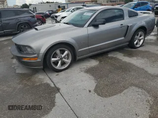 2008 Ford Mustang GT Deluxe with VIN 1ZVHT82H585115877, listed as a Copart auction lot 64524045 with 122,707 mi miles and Salvage title. Bid and sale history available at DreamBid. Image 1.