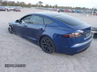 2023 Tesla Model S with VIN 5YJSA1E53PF518986, listed as a IAAI auction lot 41223046 with 22,204 mi miles and . Bid and sale history available at DreamBid. Image 3.