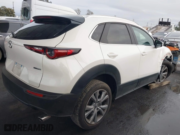 2023 Mazda CX-30 2.5 S Carbon Edition with VIN 3MVDMBCM9PM584887, listed as a IAAI auction lot 41571659 with 33,667 mi miles. Bid and sale history available at carsss.com. Image 4.