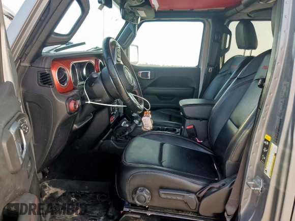 2021 Jeep Wrangler Unlimited Rubicon with VIN 1C4HJXFG0MW616829, listed as a Copart auction lot 61041425 with 128,724 mi miles and Salvage title. Bid and sale history available at DreamBid. Image 7.