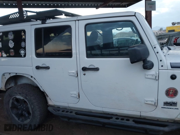 2014 Jeep Wrangler Unlimited Sahara with VIN 1C4BJWEG7EL204489, listed as a IAAI auction lot 41255239 with 68,803 mi miles and . Bid and sale history available at DreamBid. Image 13.