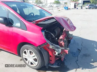 2009 Honda Fit with VIN JHMGE88299S003581, listed as a IAAI auction lot 42094464 with 187,280 mi miles. Bid and sale history available at carsss.com. Image 18.