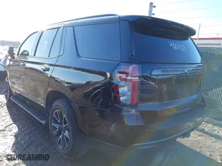 2021 Chevrolet Tahoe Z71 with VIN 1GNSKPKD1MR460353, listed as a IAAI auction lot 41427602 with 56,635 mi miles. Bid and sale history available at carsss.com. Image 3.