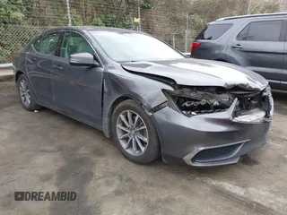 2019 Acura TLX with VIN 19UUB1F36KA004085, listed as a IAAI auction lot 41664344 with 115,125 mi miles. Bid and sale history available at carsss.com. Image 1.