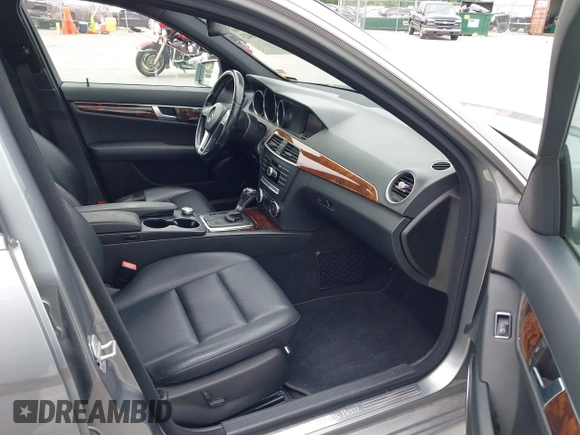 2014 Mercedes-Benz C 250 Sport with VIN WDDGF4HB6EG160494, listed as a IAAI auction lot 42310423 with 145,160 mi miles and . Bid and sale history available at DreamBid. Image 5.