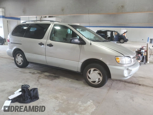 2000 Toyota Sienna LE with VIN 4T3ZF13C6YU210501, listed as a Copart auction lot 56510955 with 253,950 mi miles and Salvage title. Bid and sale history available at DreamBid. Image 4.