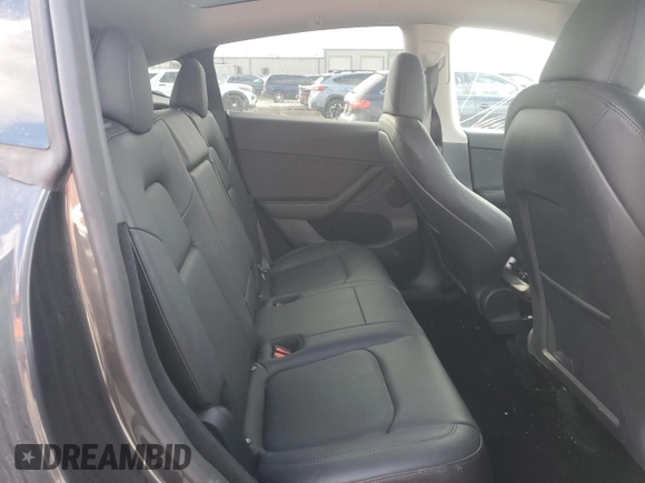 2024 Tesla Model Y Long Range with VIN 7SAYGDEE0RF985007, listed as a Copart auction lot 46619755 with Not Provided miles and Salvage Title. Bid and sale history available at DreamBid. Image 11.